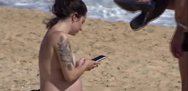  Beautiful busty pregnant topless at the beach 06